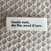 Gentle wash dry flat mend if torn Etiquette en tissu PetiteKnit - Petite Knit